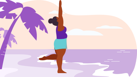 Woman doing yoga on the beach